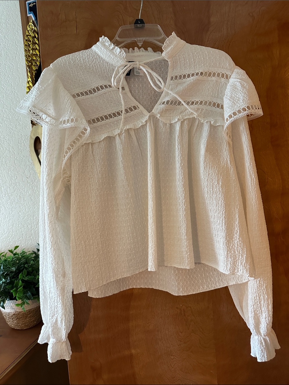 Divided White Ruffled Tie-Neck Blouse